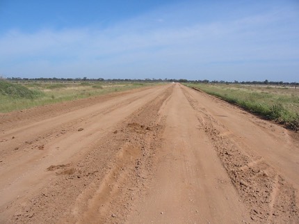 Flood damaged road before PolyCom treatment