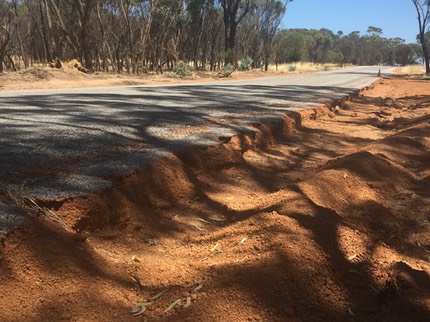 Road stabilising PolyCom Stabilising Aid flooded road WA
